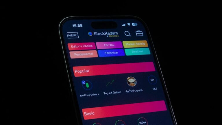 Close-up of a smartphone displaying a financial stock trading app interface.